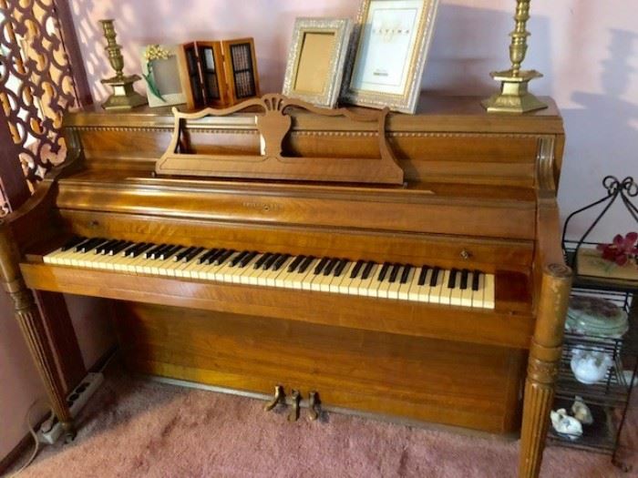 Console Piano and Picture Frames