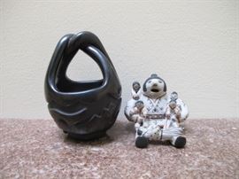 Cochiti Pueblo figure;  Madeline Tafoya Santa Clara friendship vase. 