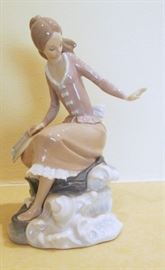 Lladro seated girl