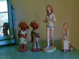 Cybis figurines: Cybis Jogger, Cybis girl on the phone