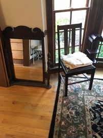 Vintage and antique furnishings, including chairs, tables, mirrors and decor