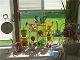 Pretty patio pieces to brighten indoors or outside. Note the two tier stand with cobalt blue glass.