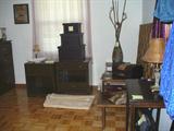 One set of the step tables, stacking leather box set, woven headboard, pottery and folded area rug to show color