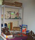 egg case, scale, Grand Rapids books, chicken carton and feeders, cuckoo clock.