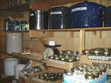 HOW'S THIS FOR A GREAT ASSORTMENT OF CANNING JARS, CANNERS, CROCKS, KRAUT CUTTER, BALL JARS?