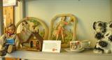 Staffordshire dogs, great old cloth Dutch doll, german weather house, and great pieces of chalkware with more in the bedroom
