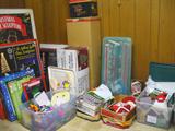 Holiday decorations still in original boxes, wrap paper, canvas net projects, etc.