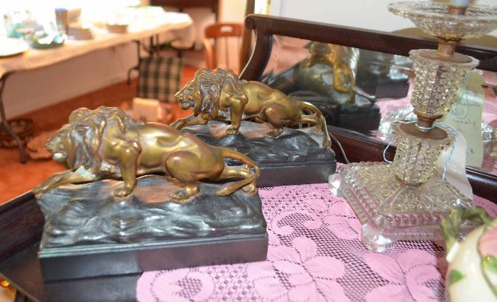 Jennings Brothers bronze stalking lion bookends; crystal lamp