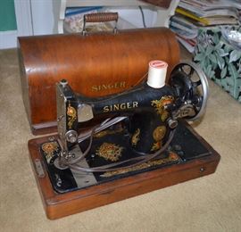 vintage Singer sewing machine with carrying case