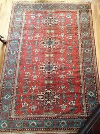 Vintage hand woven Persian Viss rug, 100% wool face, measures 4' 8" x 7'.
