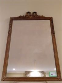 Vintage Hand carved gold gilt Frenchy mirror, with bow on top.