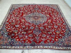 Vintage hand woven Persian Mashad rug, 100% wool face, measures 8' 6" x 7' 6".