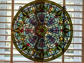 Very pretty round stained glass window in the breakfast room.