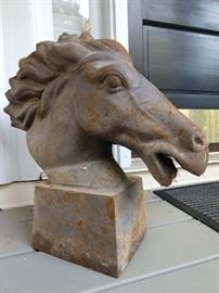 Please don't feed the cast iron horse heads, they may grow up to be cowboys. No matter WHAT the president tweets, this horse head bears absolutely no resemblance to Stormy Daniels. Carry on.