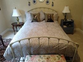 Queen size vintage iron bed, with relatively unused mattresses.