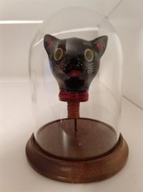 Nothing to see here folks, just a vintage terra cotta cat head under glass. You can buy this for your huzzbin and tell him that you're having that famous French dish for dinner "Chatte sous verre" or"Puss Under Glass". It's the other white meat!