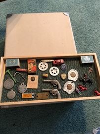 Smalls collectibles in glass case