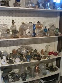 many glass oil lamps