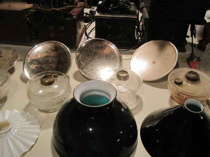 oil lamps & reflectors & green cased shades
