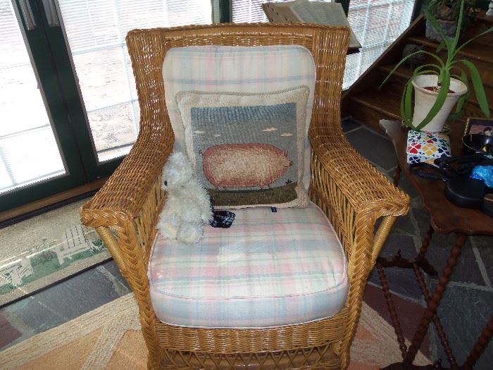 Pair of wicker easy chairs with cushions