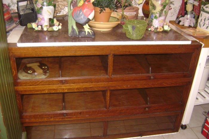 OAK CANDY STORE CABINET WITH "LAWYER BOOKCASE DOORS"---HAS AN ADDED ON PINK MARBLE TOP-----GREAT FOR A KITCHEN CENTER  COUNTER