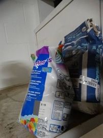 2 opened bags of grout