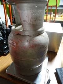 Jug of freon Weighs 14.10 LB