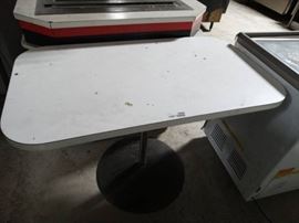 Pedestal base dining table