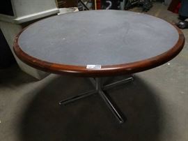 Round pedestal base dining table
