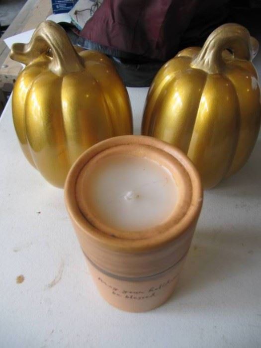2 Ceramic pumpkins aboout 6 tall and candle about ...