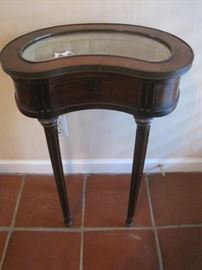 Kidney Shaped Display Table.