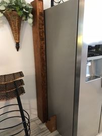 Otto Pinsky Fireplace Mantel leaning on Frig