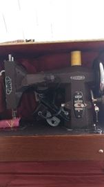 Vintage Kenmore sewing machine in the box