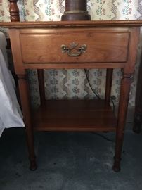 Many small bedside and occasional tables.