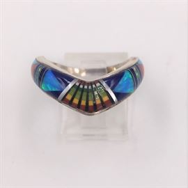 Native American sterling silver and inlaid stones ring.