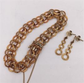 14K gold mid century modern gold bracelet and matching earrings.