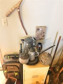 Campfire dishes, file cabinet, suitcase, antique washing stick