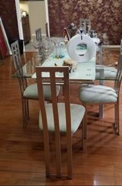 glass top modernist table and chairs Italy