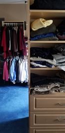 massive closet with clothing hats, t shirts, coats, ties etc