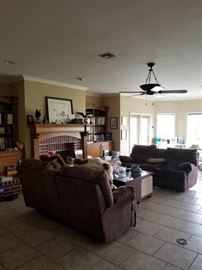 two sofas with coffee table and upholstered seats