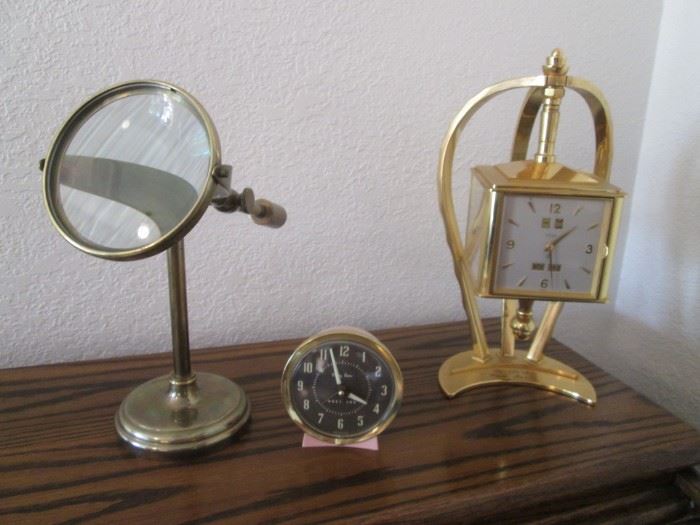 Baby Ben Clock by Westclox. Brass Clock on Revolving Stand, 15 Jewel, Barometer, Thermometer, Hygrometer. Old Magnifying Glass on Stand.