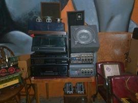 Turn Tables, Beta Players, Various Speakers in and out of cabinets, Receivers, Jim Beam Whiskey Train set of Decanters