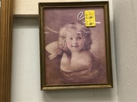 Pictures throughout the warehouse - various sizes and subject matter.