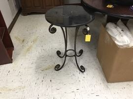 Small metal table with marble top