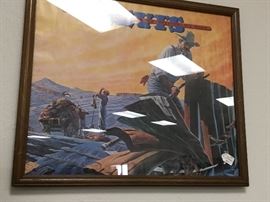 Pictures throughout the warehouse - various sizes and subject matter. This one is a Levi Strauss original advertising poster