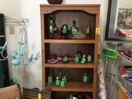 Top shelf has vintage whiskey decanters