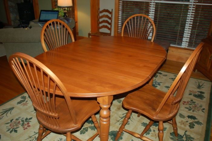 Canadian Bedford Furniture dining room table with four spindle back chairs.  Beautiful!