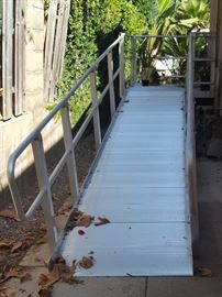 Great Condition Aluminum Ramp and Landing. Fits over the existing 3 step landing.