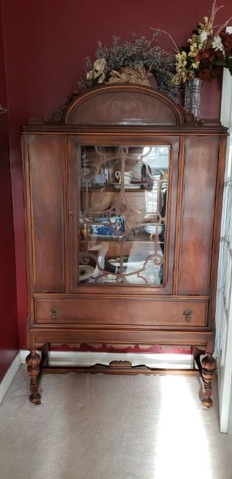 There are two of these beautiful china cabinets 