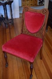 Single vintage chair with velvet seat and back rest.